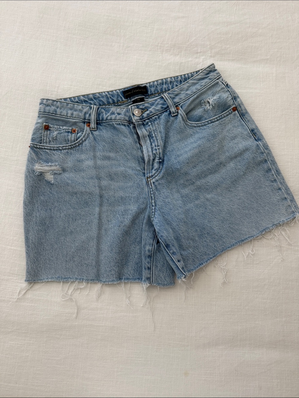 House of Harlow 1960 Light Blue Distressed Denim Cutoff Shorts